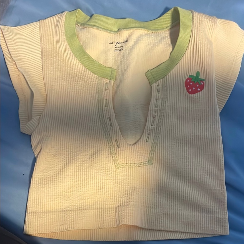 Yellow shirt with Green Trim